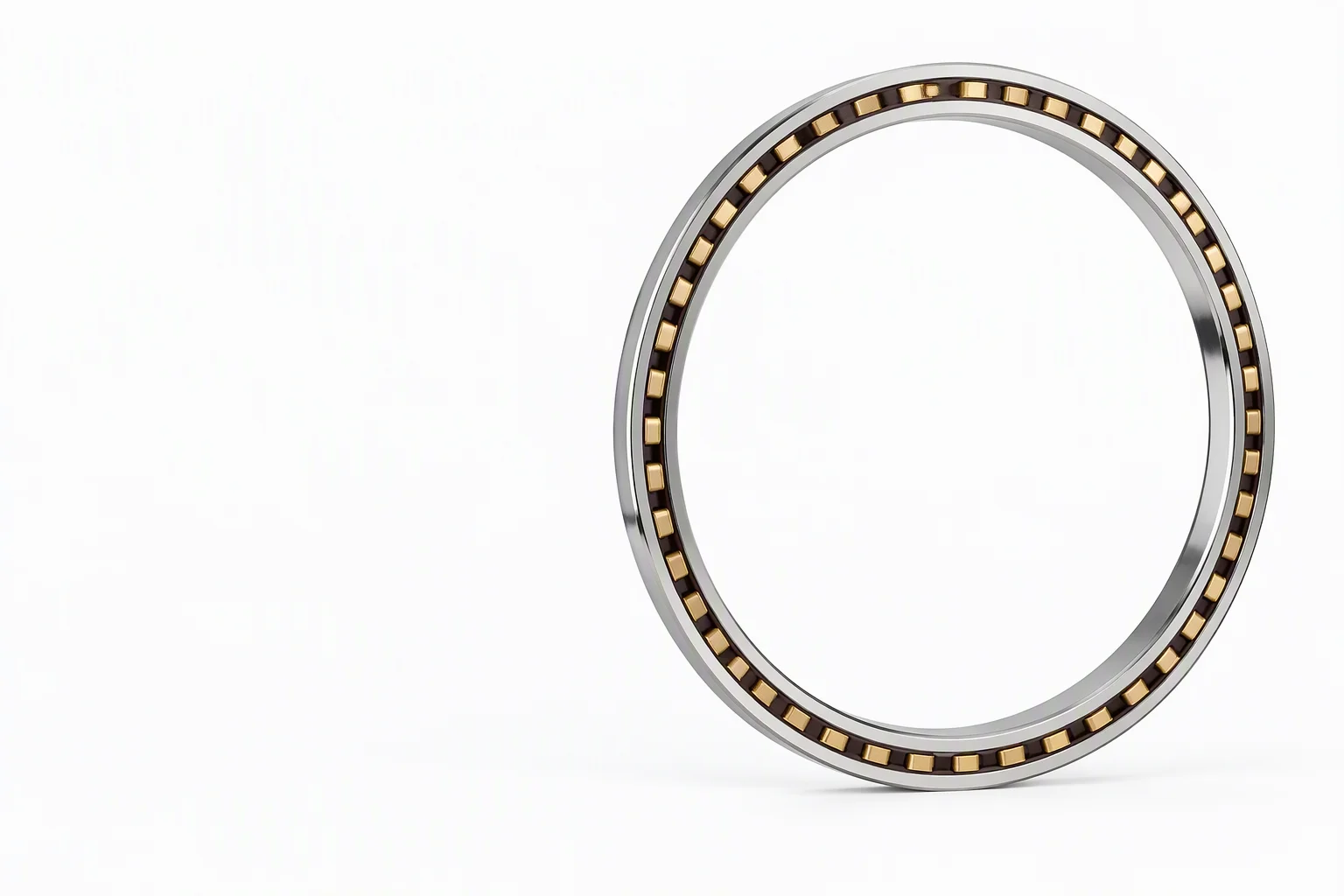 A large precision bearing ring standing on a pale ground, its ground raceway and brass cage catching a raking light, the left of the frame left clear